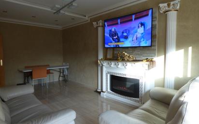 Living room of Planta baja for sale in Ripollet  with Air Conditioner, Terrace and Storage room