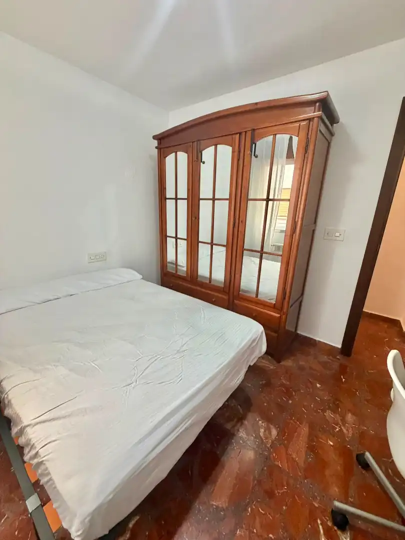 Bedroom of Flat for share in Jaén  with Air Conditioner, Heating and Furnished