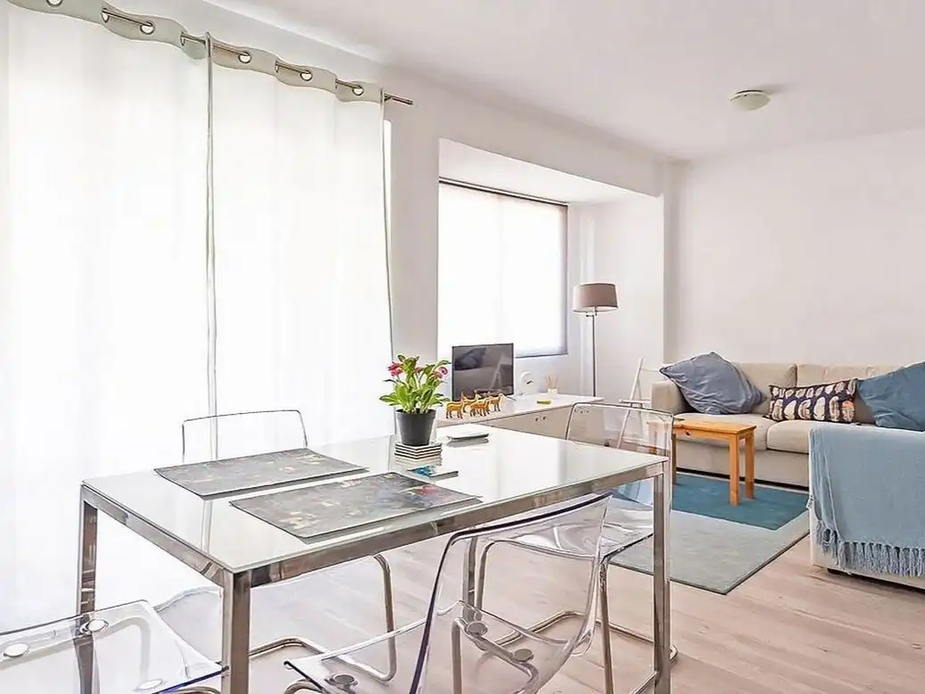 Sala de estar de Apartamento para compartir en Huelva con Aire acondicionado y Amueblado