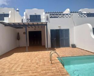 Exterior view of Duplex for sale in Yaiza  with Storage room, Swimming Pool and Furnished