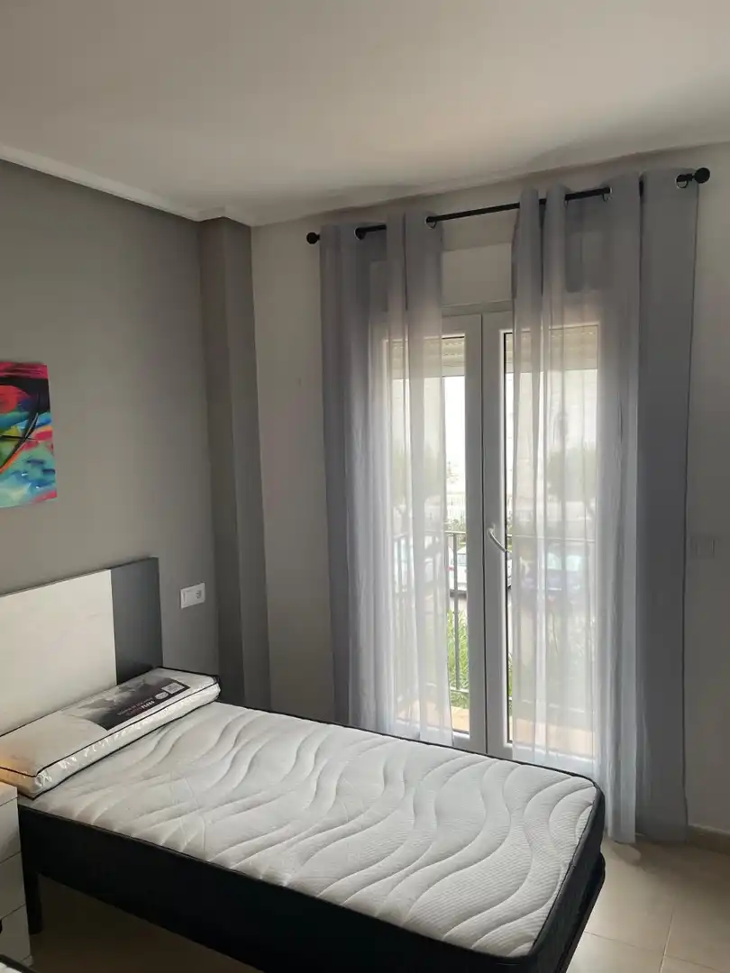 Dormitori de Apartament de lloguer en Torre-Pacheco amb Aire condicionat, Piscina i Moblat