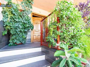Casa aparellada amb jardí en venda a Camino CEMENTERIO 14