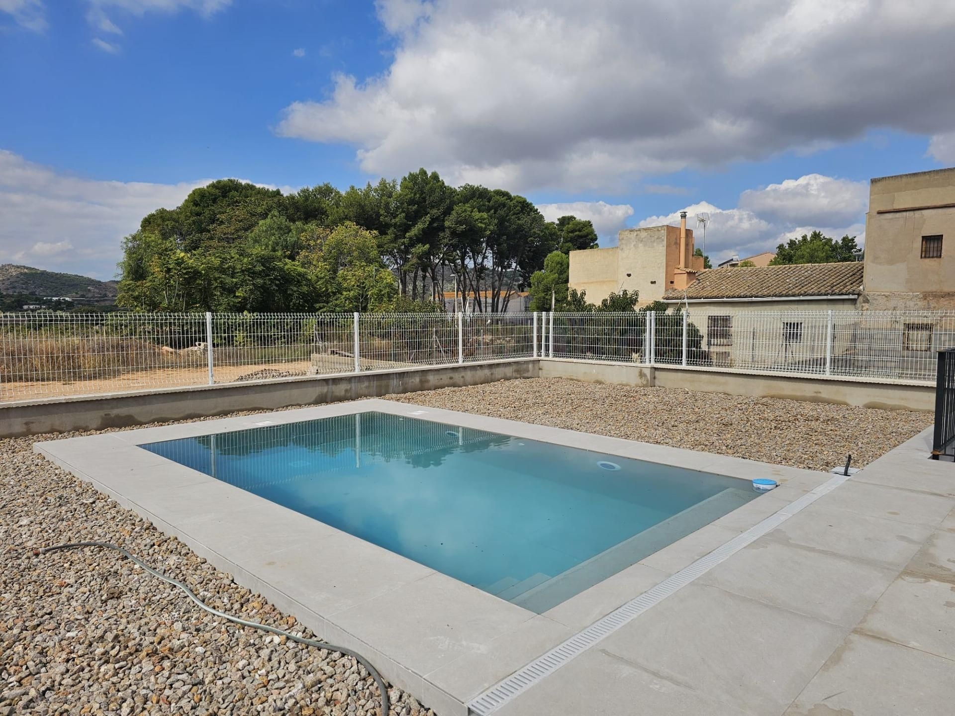 Piscina de Casa adosada en venda en Benisanó amb Jardí privat, Terrassa i Traster