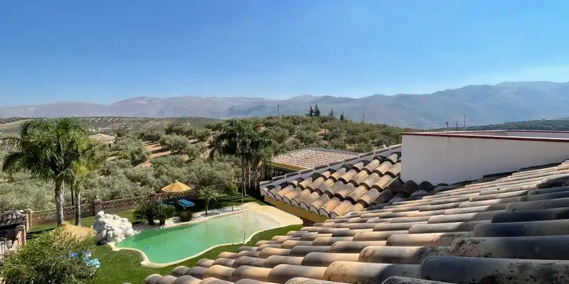 Vista exterior de Casa o xalet en venda en Loja amb Aire condicionat, Jardí privat i Terrassa