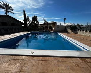Swimming pool of House or chalet for sale in La Rinconada  with Air Conditioner, Heating and Storage room