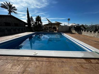Swimming pool of House or chalet for sale in La Rinconada  with Air Conditioner, Heating and Storage room