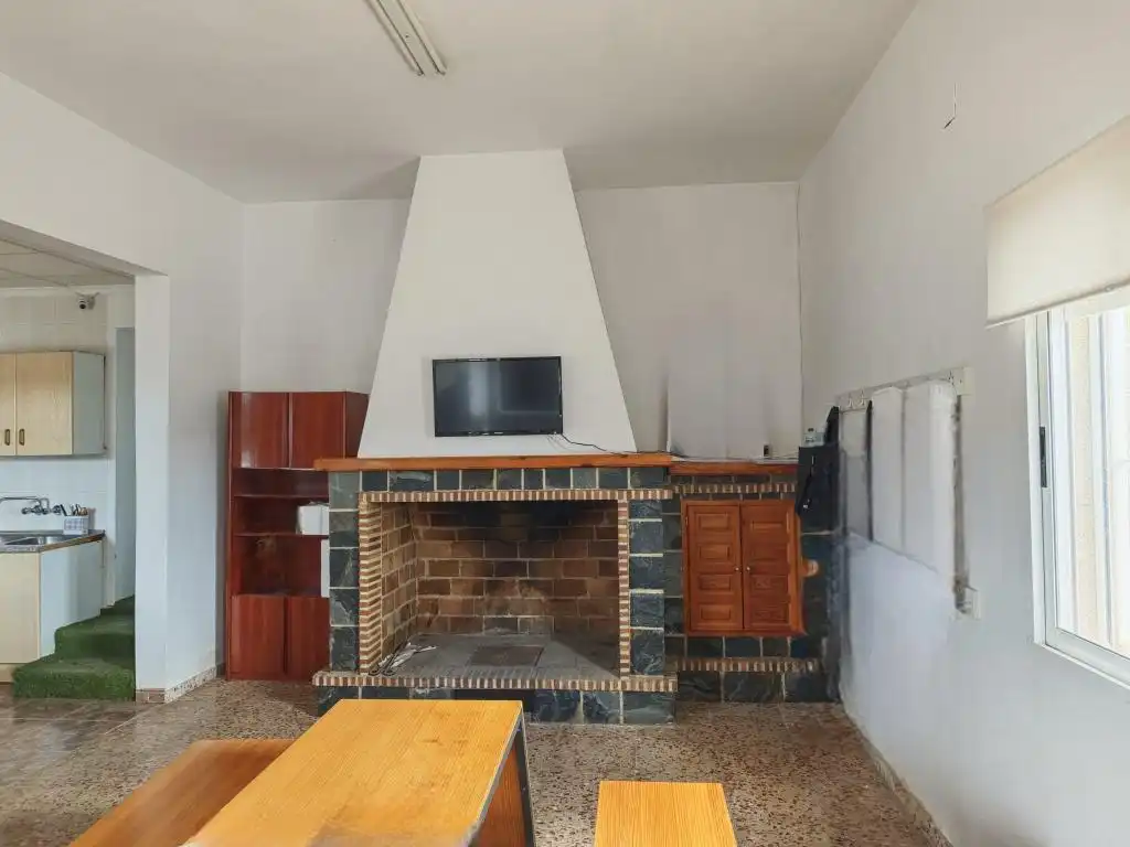 Sala de estar de Casa adosada en venta en Totana con Aire acondicionado, Amueblado y Microondas