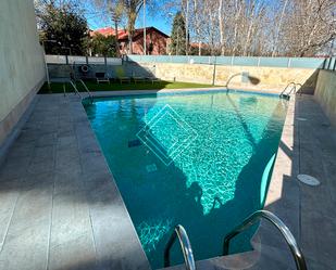 Swimming pool of House or chalet for sale in  Madrid Capital  with Air Conditioner, Heating and Terrace