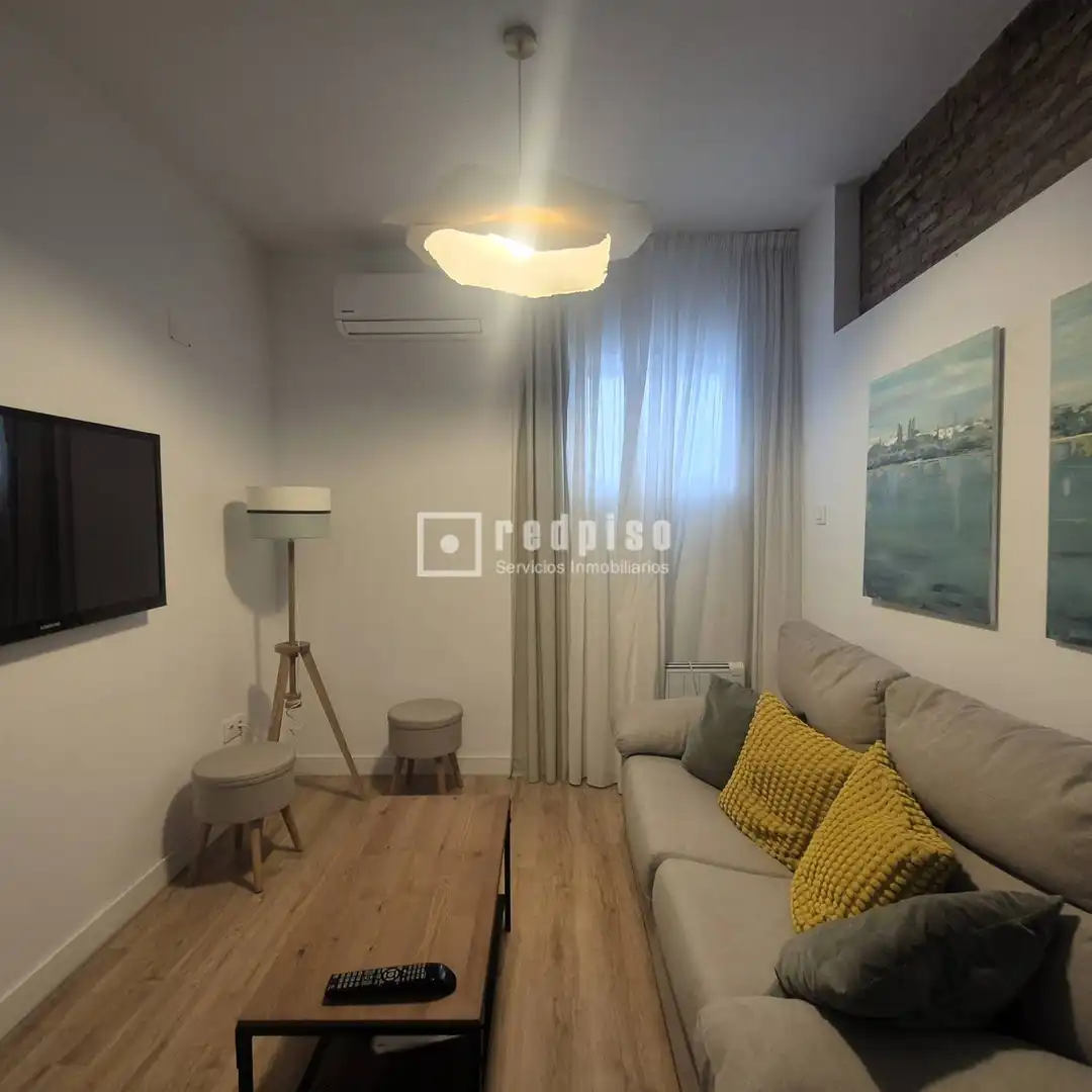 Sala d'estar de Apartament en venda en Sevilla amb Aire condicionat, Moblat i Alarma