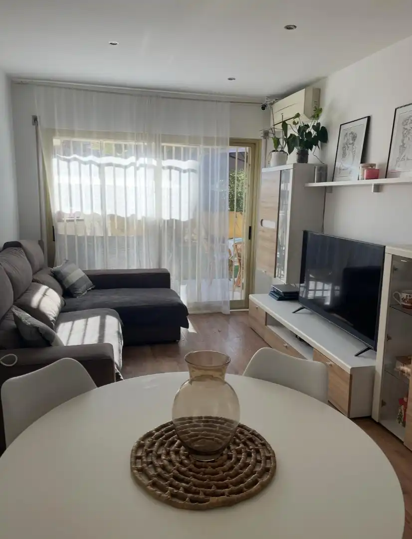 Living room of Ground floor for sale in Salou  with Private garden, Terrace and Furnished
