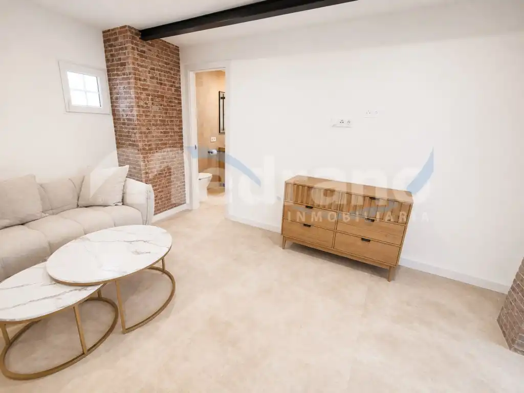 Sala de estar de Apartamento de alquiler en La Nucia con Aire acondicionado, Calefacción y Jardín privado