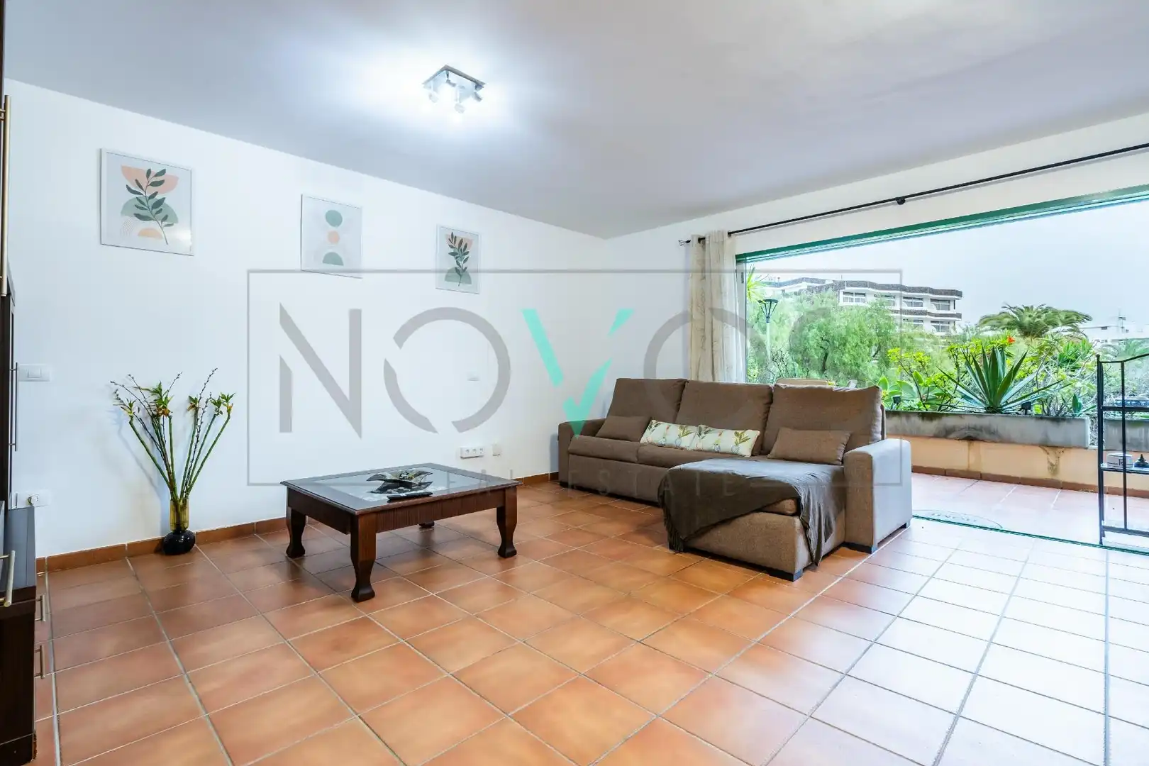 Sala d'estar de Pis de lloguer en Puerto de la Cruz amb Jardí privat, Terrassa i Moblat