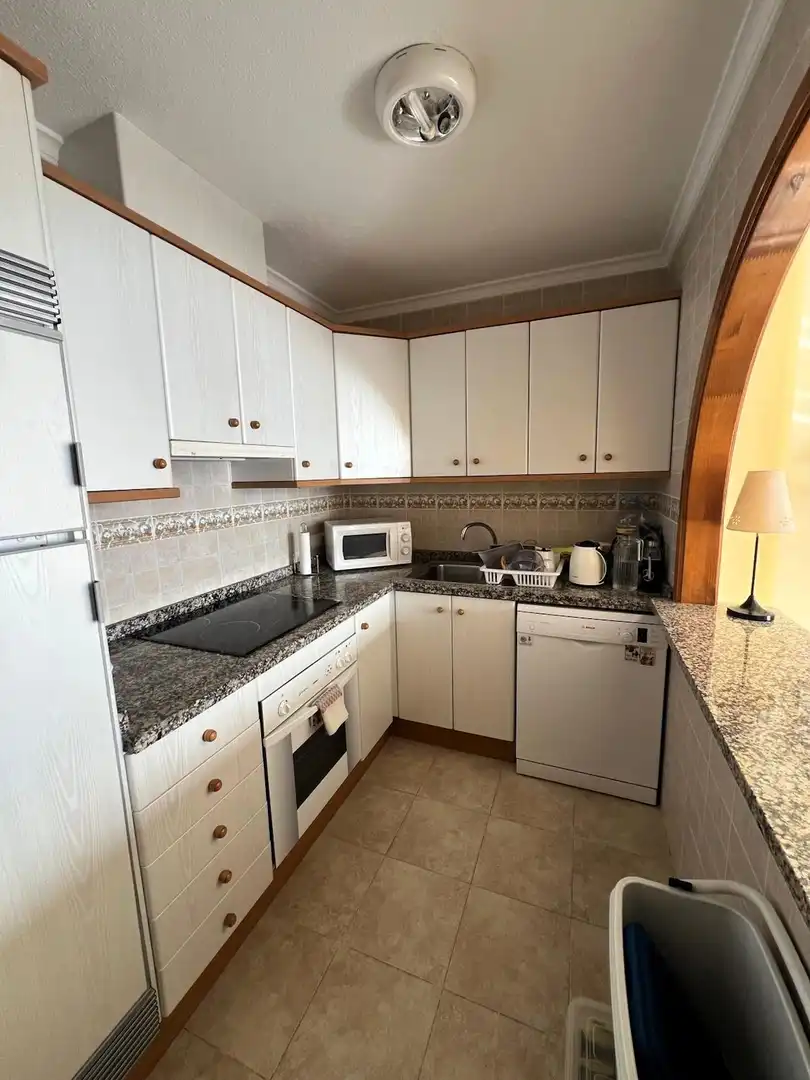 Cuina de Apartament de lloguer en Benitachell / El Poble Nou de Benitatxell amb Jardí privat, Terrassa i Piscina comunitària