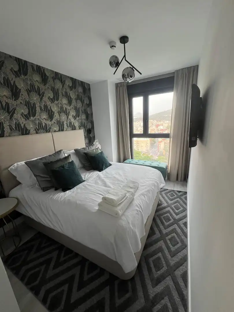 Habitación de Apartamento de alquiler en Málaga con Aire acondicionado, Amueblado y Piscina comunitaria