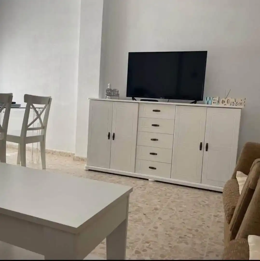 Sala d'estar de Pis de lloguer en Chipiona amb Aire condicionat, Moblat i Rentadora