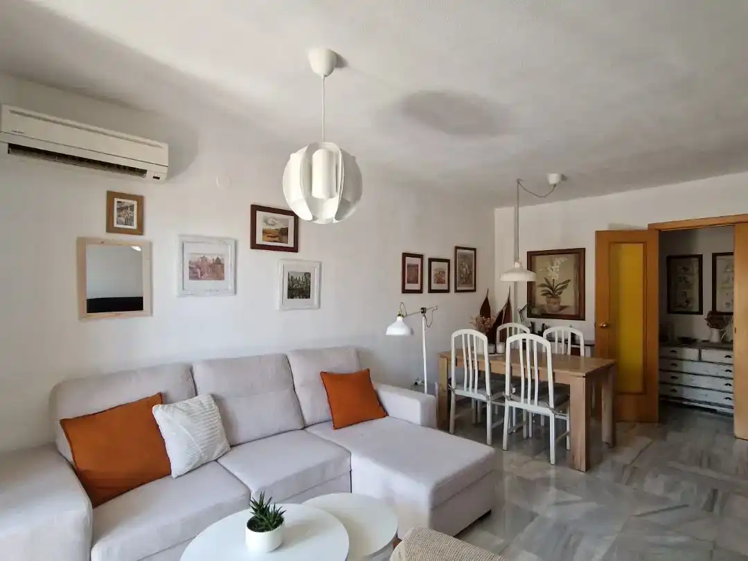 Living room of Flat for sale in Benalmádena  with Air Conditioner and Swimming Pool