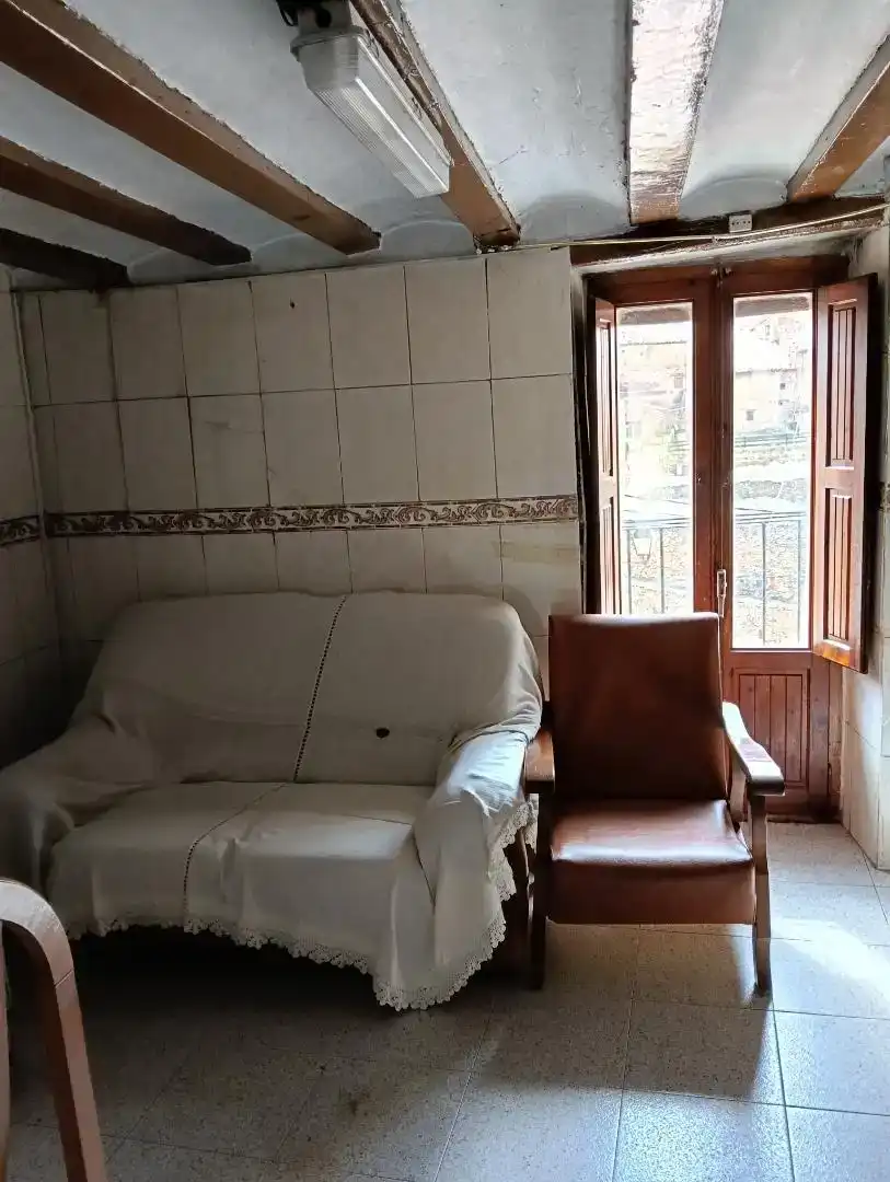 Sala d'estar de Casa adosada en venda en La Iglesuela del Cid