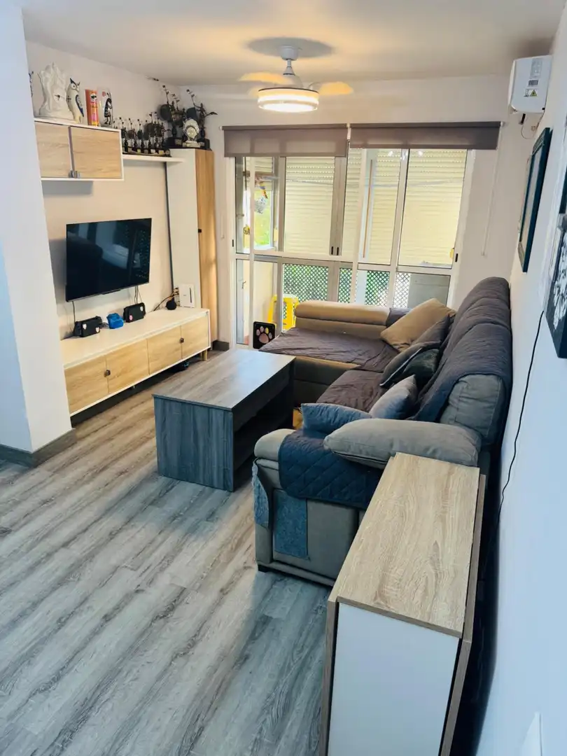Sala de estar de Piso en venta en Sevilla con Aire acondicionado, Calefacción y Terraza