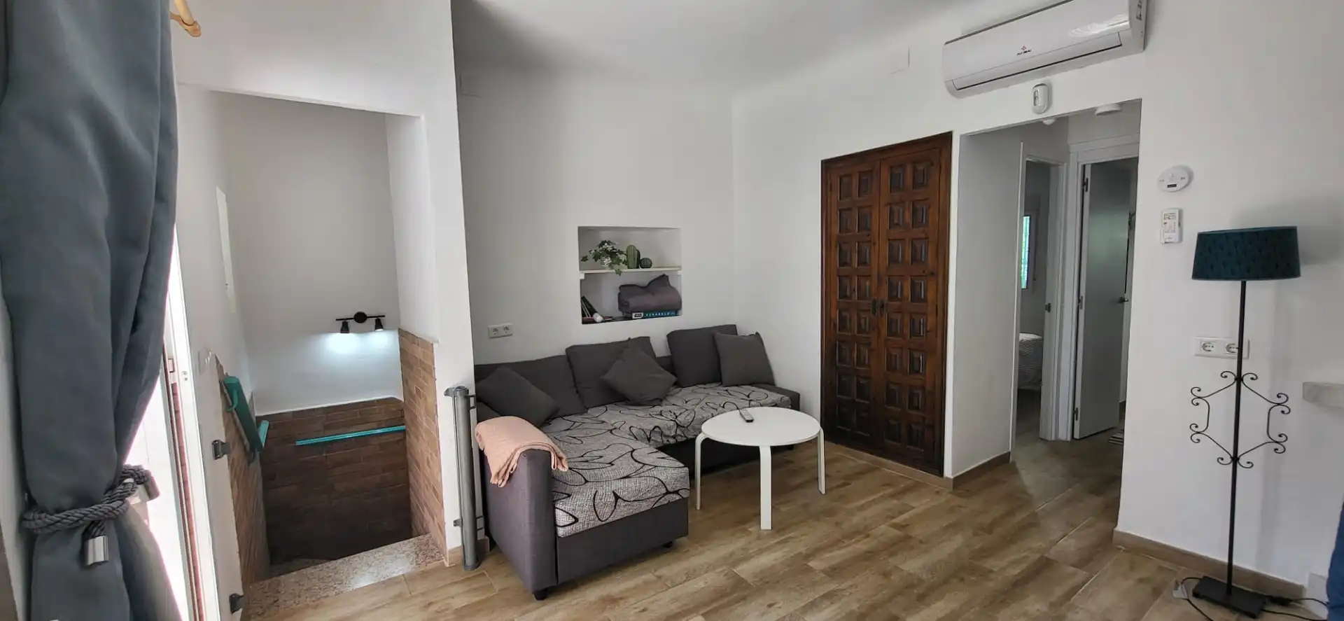Sala d'estar de Casa adosada en venda en Vélez-Málaga amb Aire condicionat, Terrassa i Moblat