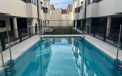 Swimming pool of Flat for sale in  Madrid Capital  with Air Conditioner, Heating and Parquet flooring