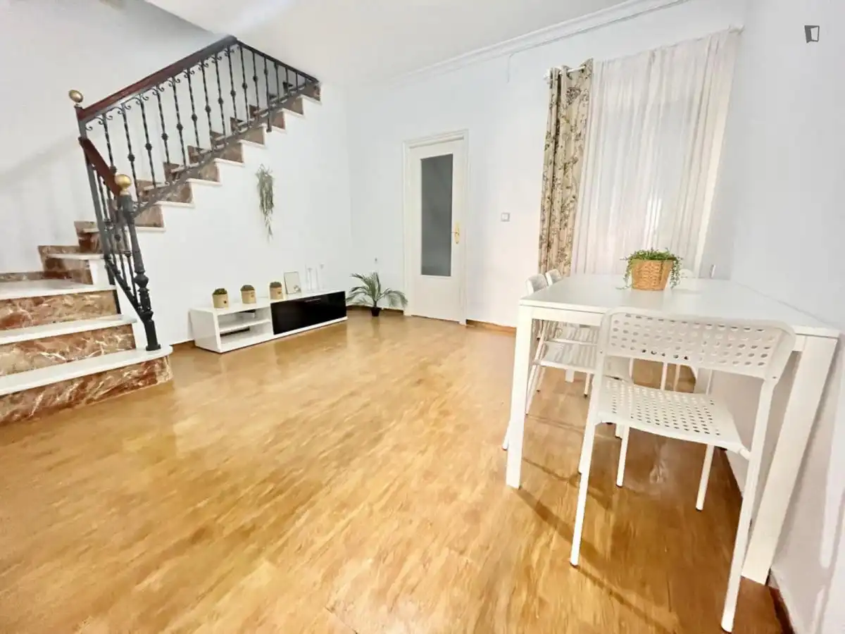 Sala de estar de Casa o chalet para compartir en Santiponce con Amueblado, Horno y Lavadora