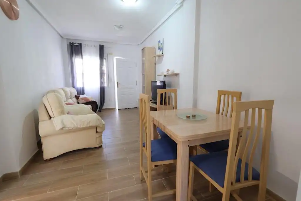 Sala d'estar de Casa o xalet en venda en Orihuela amb Aire condicionat, Jardí privat i Terrassa