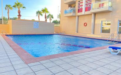 Swimming pool of Flat for sale in El Campello  with Air Conditioner, Heating and Storage room