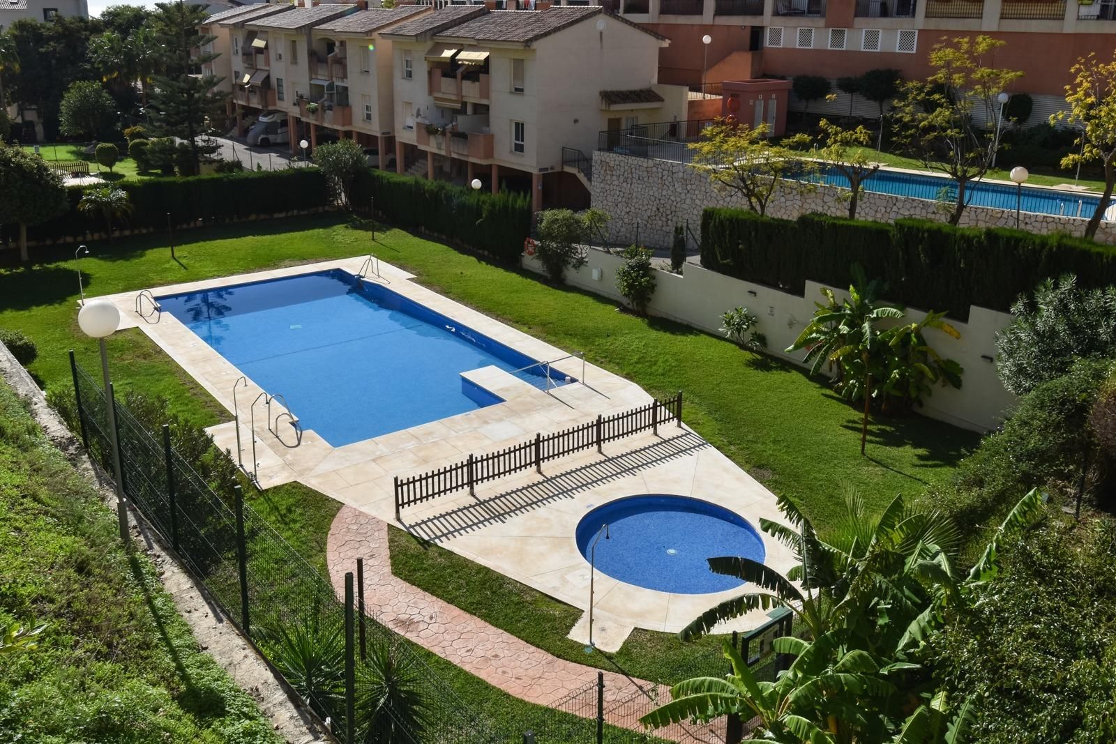 Piscina de Apartament de lloguer en Benalmádena amb Aire condicionat, Calefacció i Jardí privat