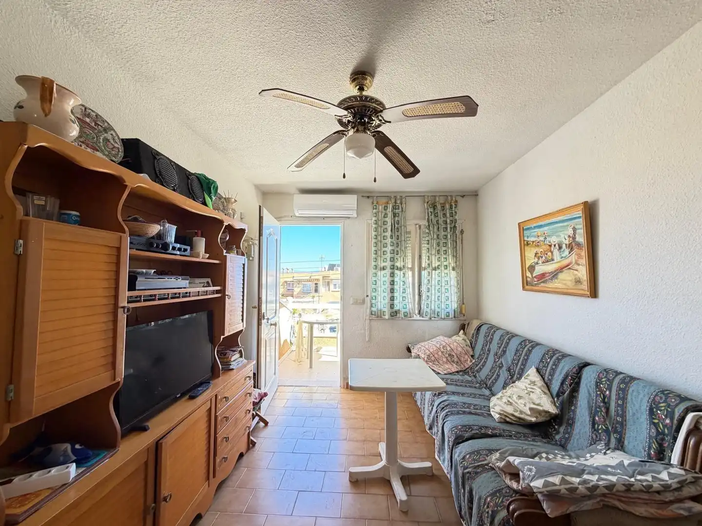 Sala d'estar de Casa adosada en venda en Santa Pola amb Aire condicionat, Calefacció i Terrassa
