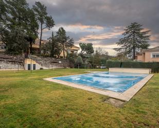 Swimming pool of Single-family semi-detached for sale in Galapagar  with Air Conditioner, Heating and Private garden