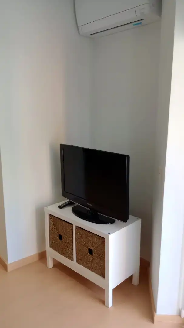 Sala d'estar de Apartament de lloguer en Benicasim / Benicàssim amb Aire condicionat, Calefacció i Jardí privat