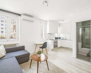 Living room of Study to share in  Madrid Capital  with Air Conditioner, Heating and Terrace