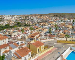 Vista exterior de Casa o xalet en venda en Rojales amb Aire condicionat, Jardí privat i Terrassa