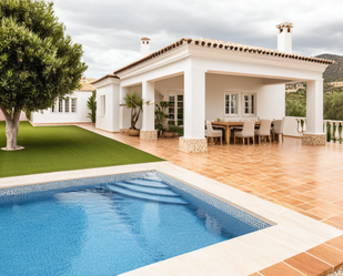 Swimming pool of House or chalet for sale in Benalmádena  with Air Conditioner, Heating and Private garden