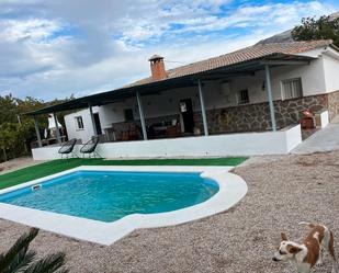 Piscina de Finca rústica de lloguer en Sedella amb Jardí privat, Piscina i Moblat