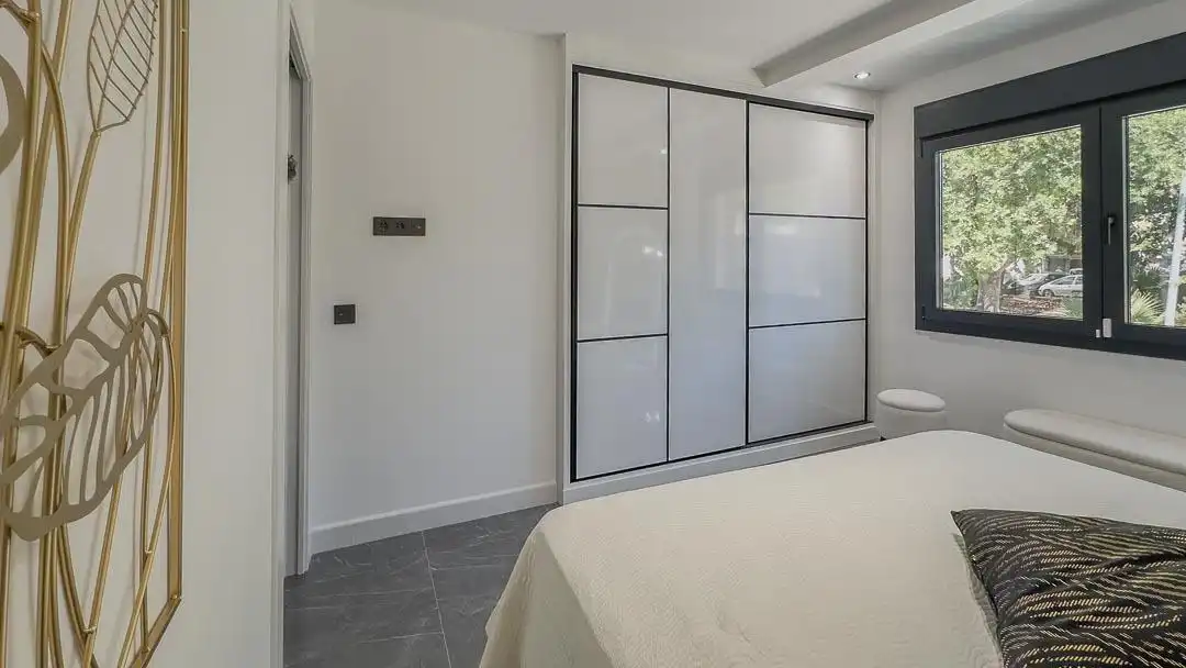 Habitación de Casa adosada en venta en Málaga con Aire acondicionado, Terraza y Amueblado