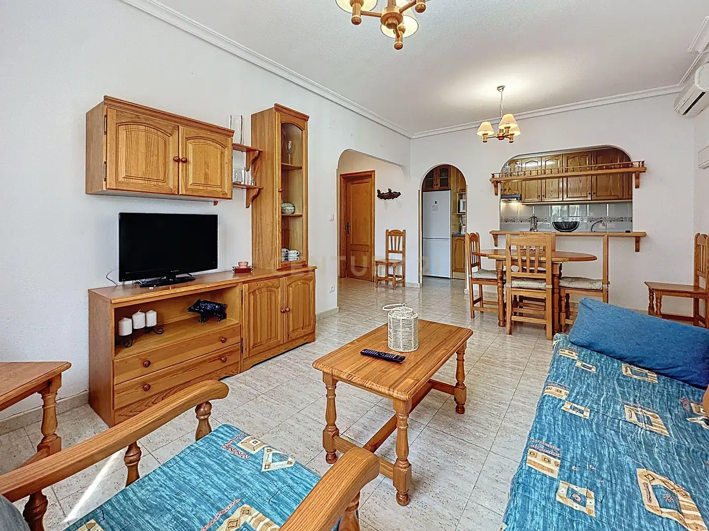 Sala de estar de Casa adosada en venta en Orihuela con Aire acondicionado, Jardín privado y Trastero
