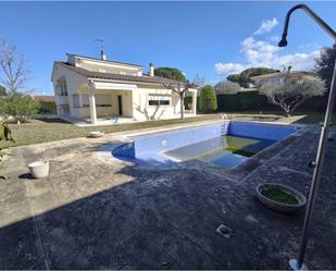 Swimming pool of House or chalet for sale in Aiguaviva  with Air Conditioner, Terrace and Swimming Pool