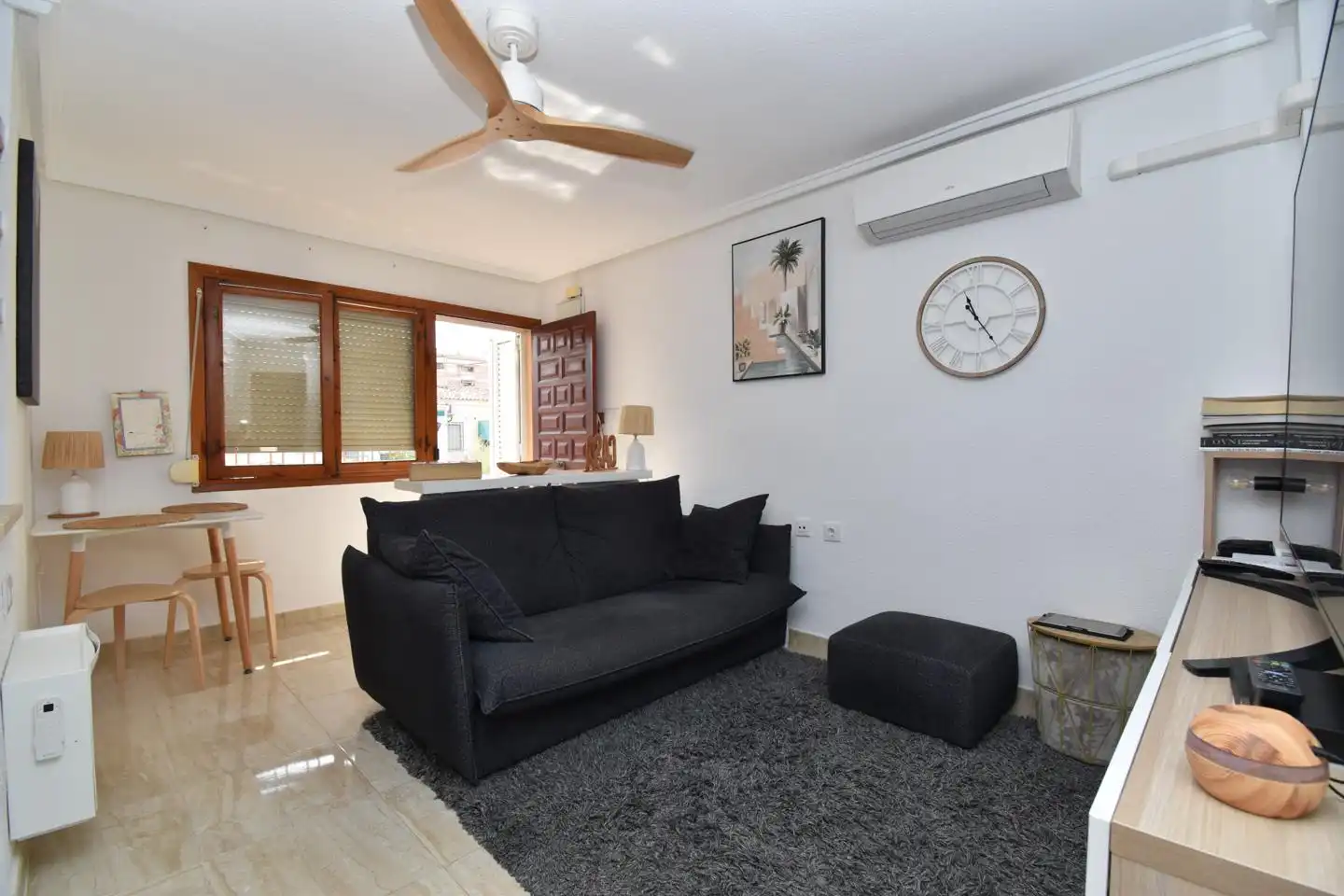 Sala d'estar de Pis en venda en Santa Pola amb Aire condicionat, Jardí privat i Terrassa