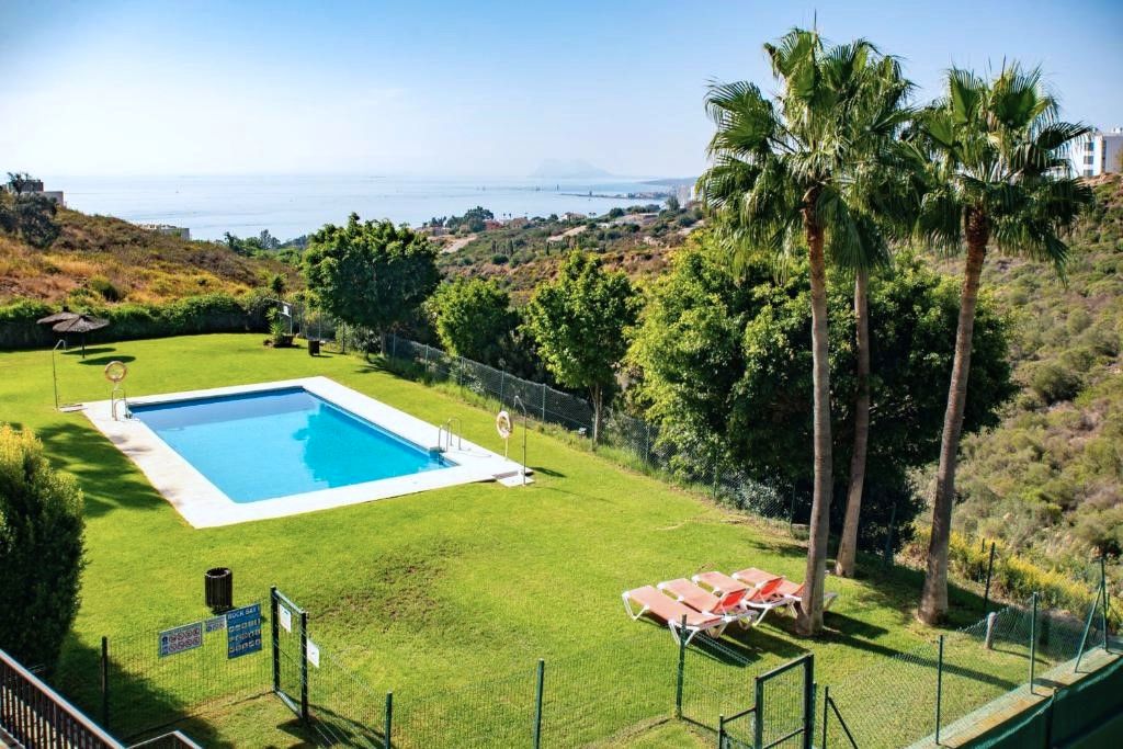 Jardí de Apartament de lloguer en Manilva amb Aire condicionat, Calefacció i Terrassa