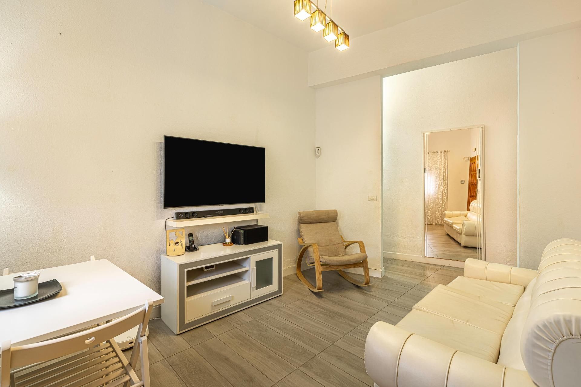 Living room of Planta baja for sale in San Cristóbal de la Laguna  with Air Conditioner and Storage room