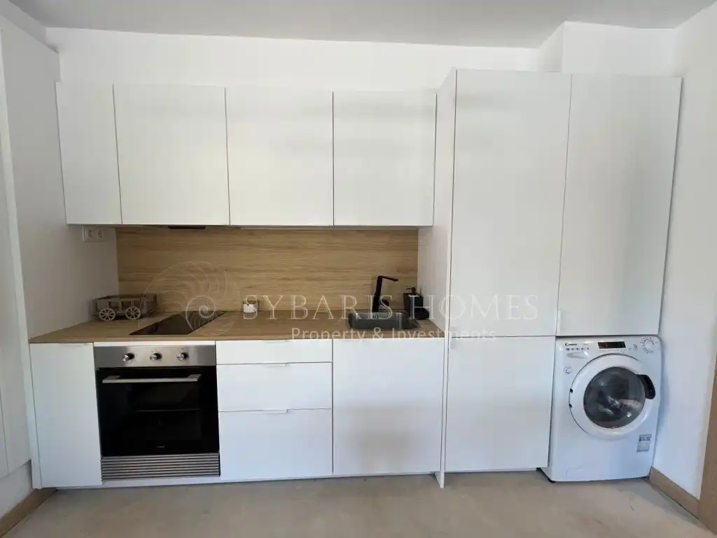 Küche von Wohnung zum Verkauf in Dénia mit Klimaanlage, Privatgarten und Terrasse
