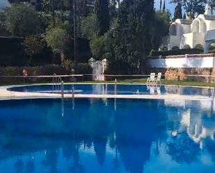 Swimming pool of House or chalet for sale in Benalmádena  with Air Conditioner, Heating and Private garden