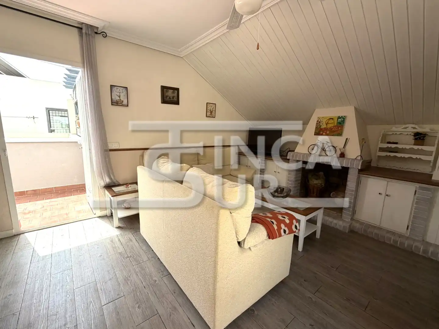 Sala de estar de Casa adosada en venta en Roquetas de Mar con Aire acondicionado, Calefacción y Terraza