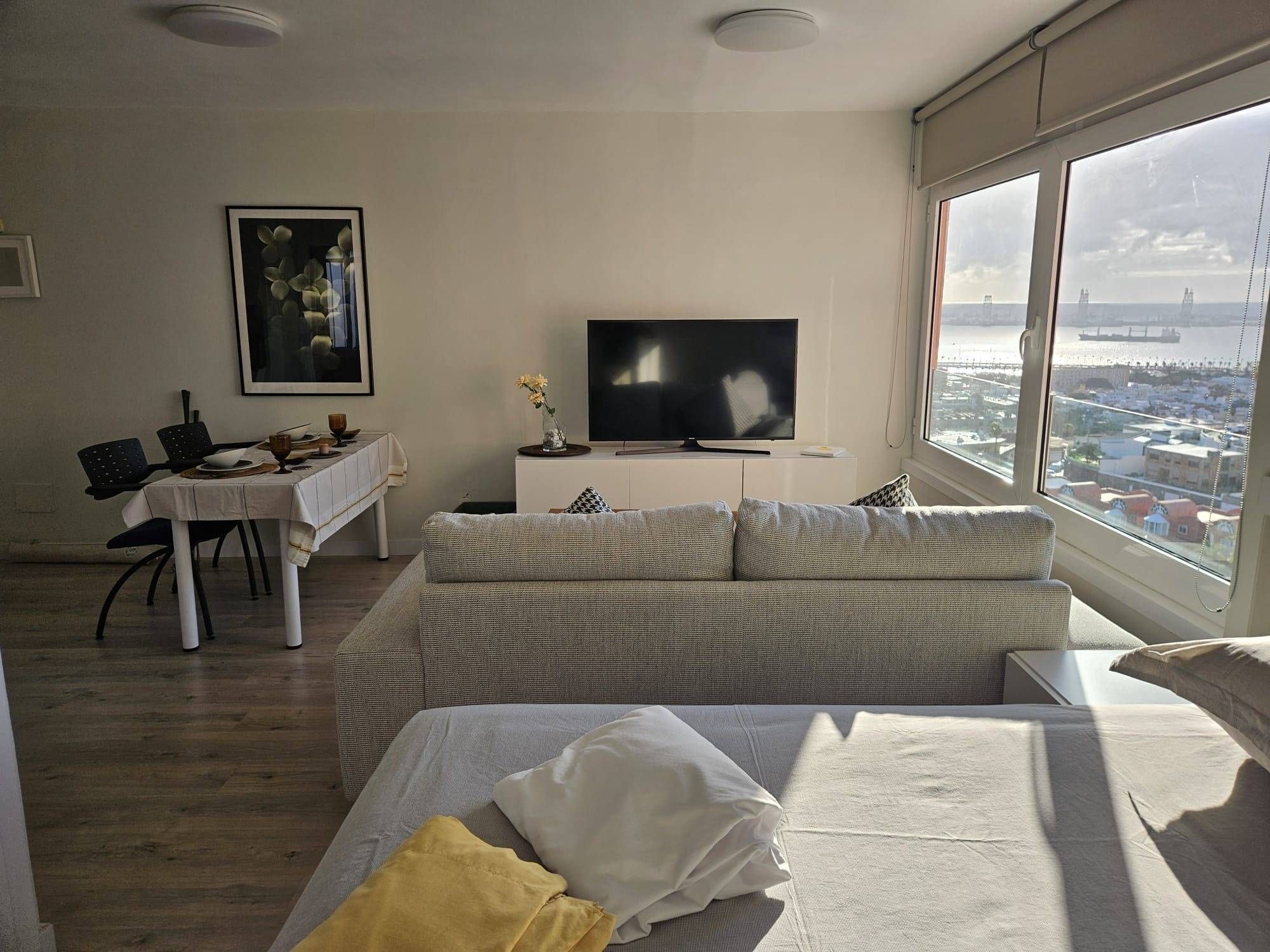 Living room of Flat for rent in Las Palmas de Gran Canaria  with Parquet flooring, Furnished and Community pool