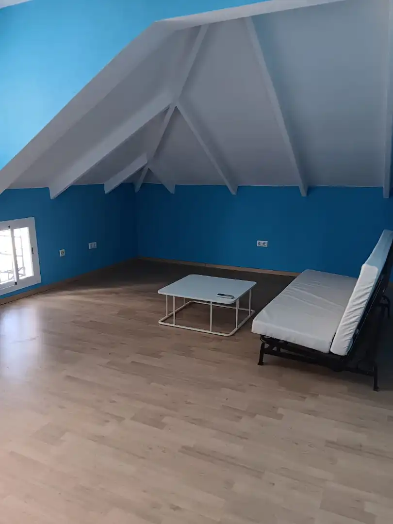 Habitación de Casa adosada de alquiler en Castilleja de la Cuesta con Aire acondicionado