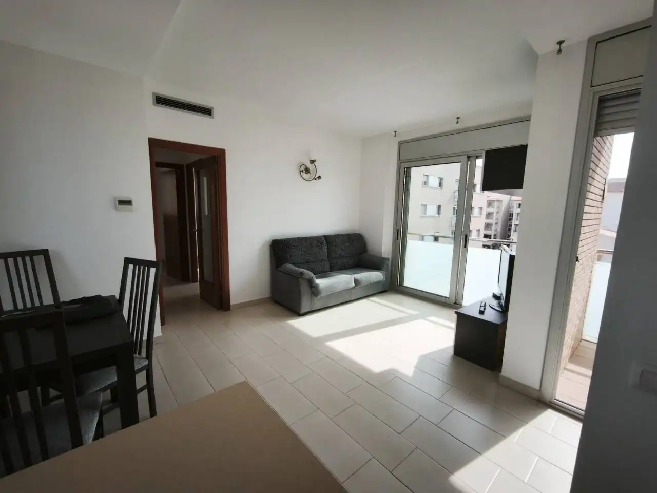 Wohnzimmer von Wohnung zum Verkauf in Calafell mit Klimaanlage, Heizung und Terrasse
