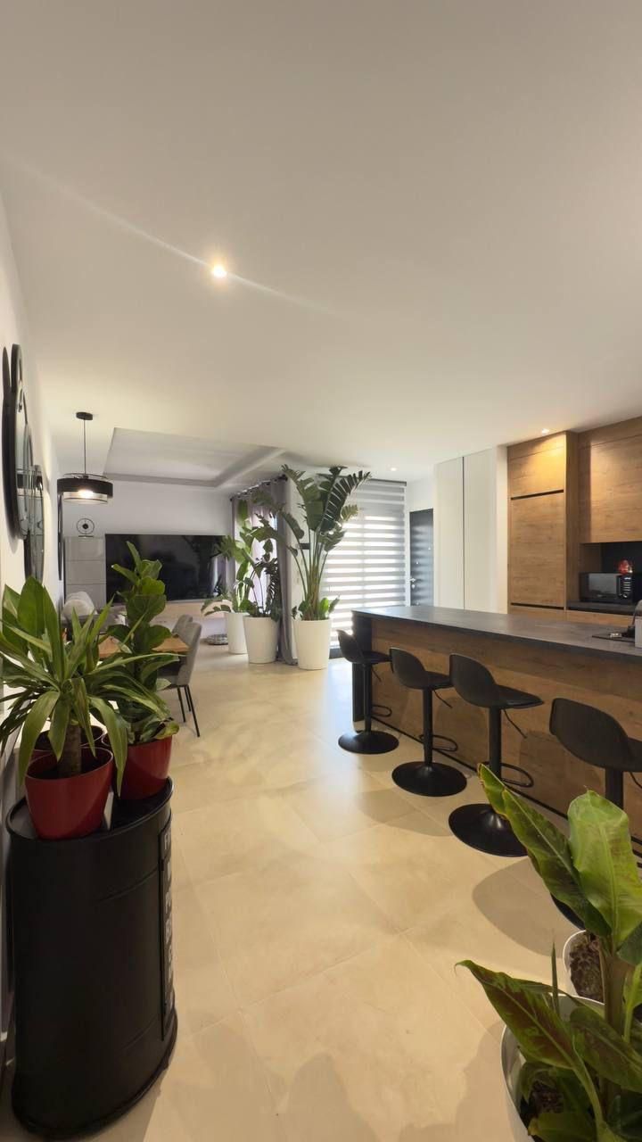 Sala d'estar de Casa o xalet de lloguer en Finestrat amb Aire condicionat, Jardí privat i Terrassa