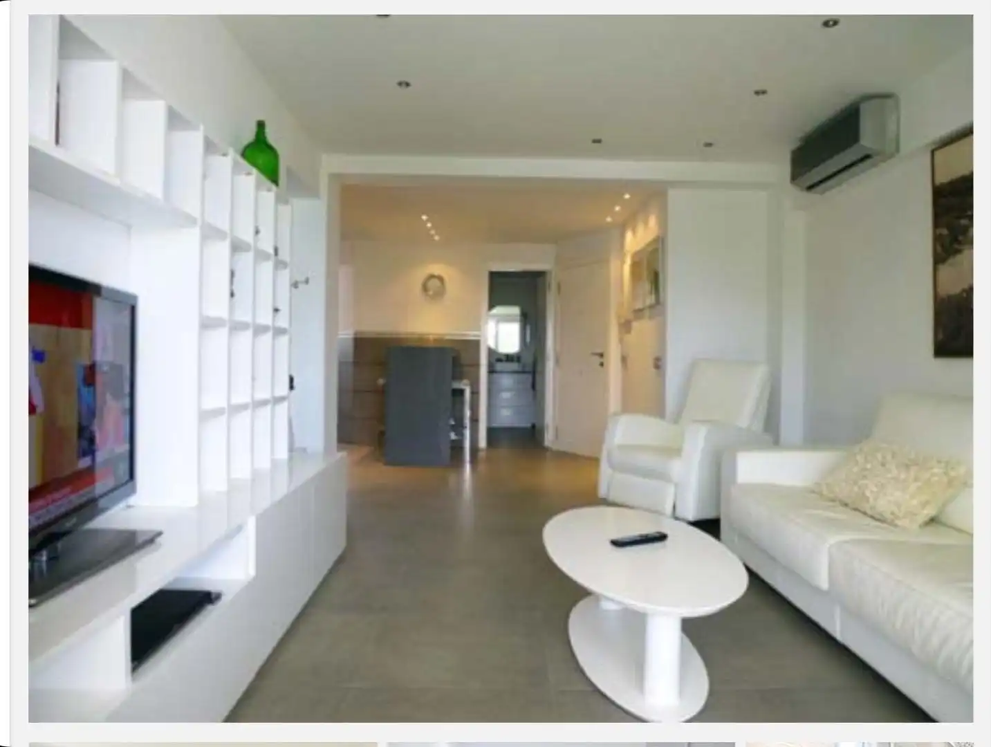 Sala d'estar de Apartament en venda en Benicasim / Benicàssim amb Parquet, Moblat i Rentadora