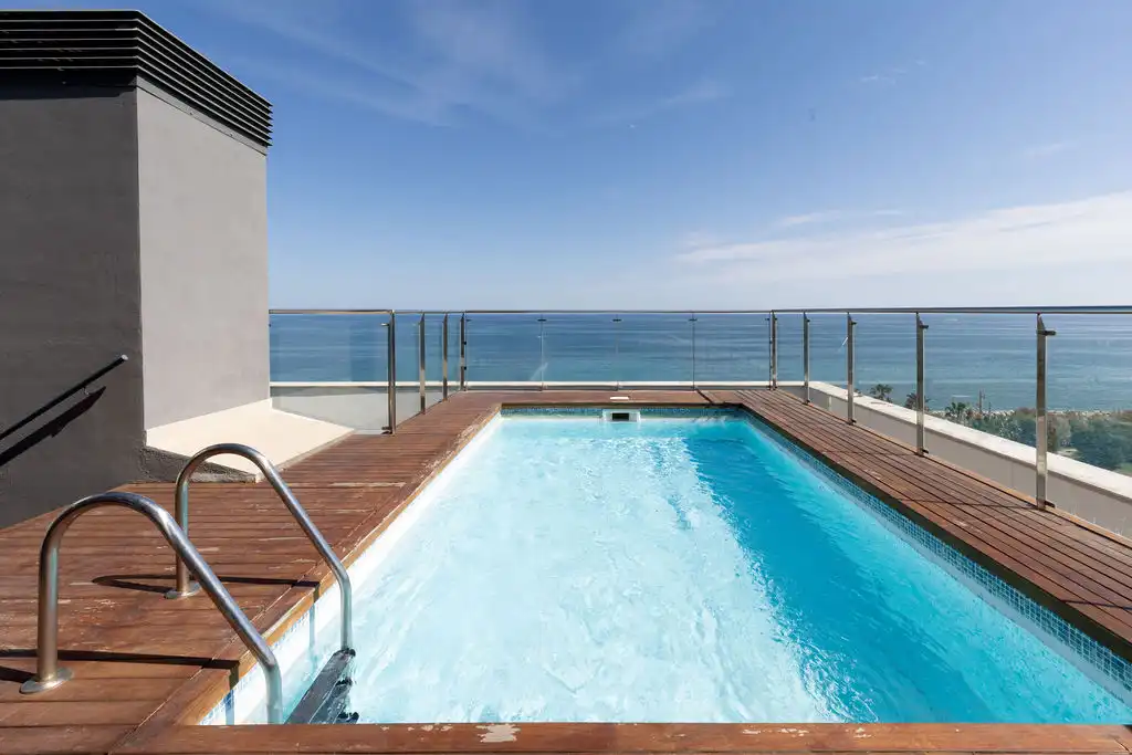 Swimming pool of Apartments for sale in Mataró  with Air Conditioner, Heating and Parquet flooring